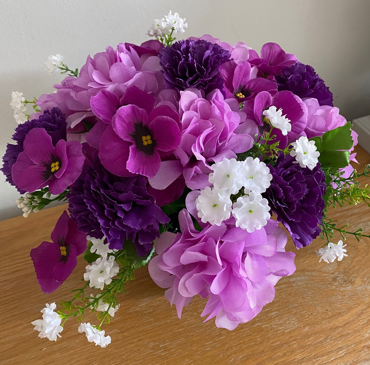 Silk flower graveside memorial tribute flower arrangement Evetlasting flowers carnations pansies dahlias babies breath