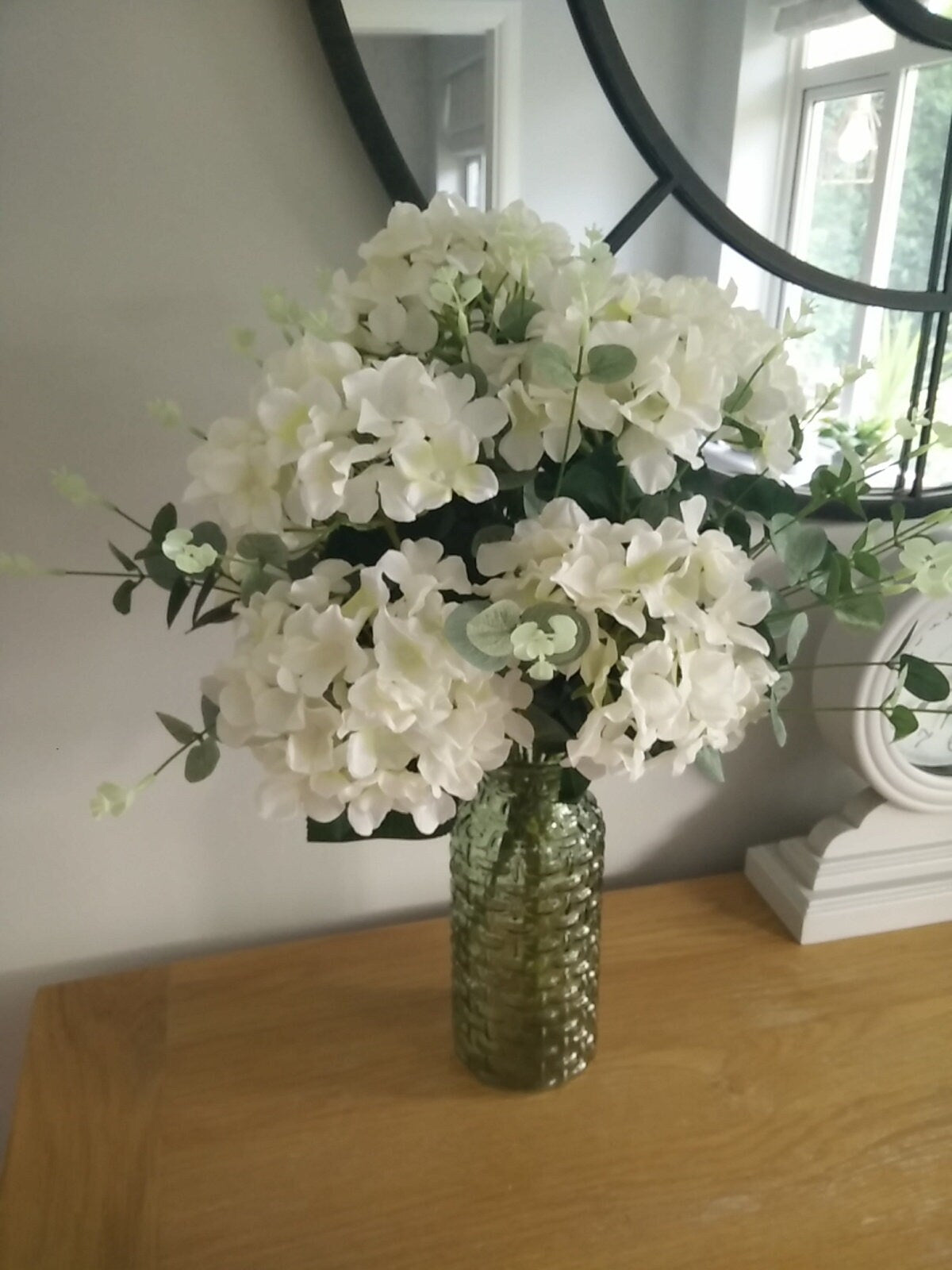 Hydrangea and Eucalyptus Silk Flower Arrangement With A Green Glass Vase